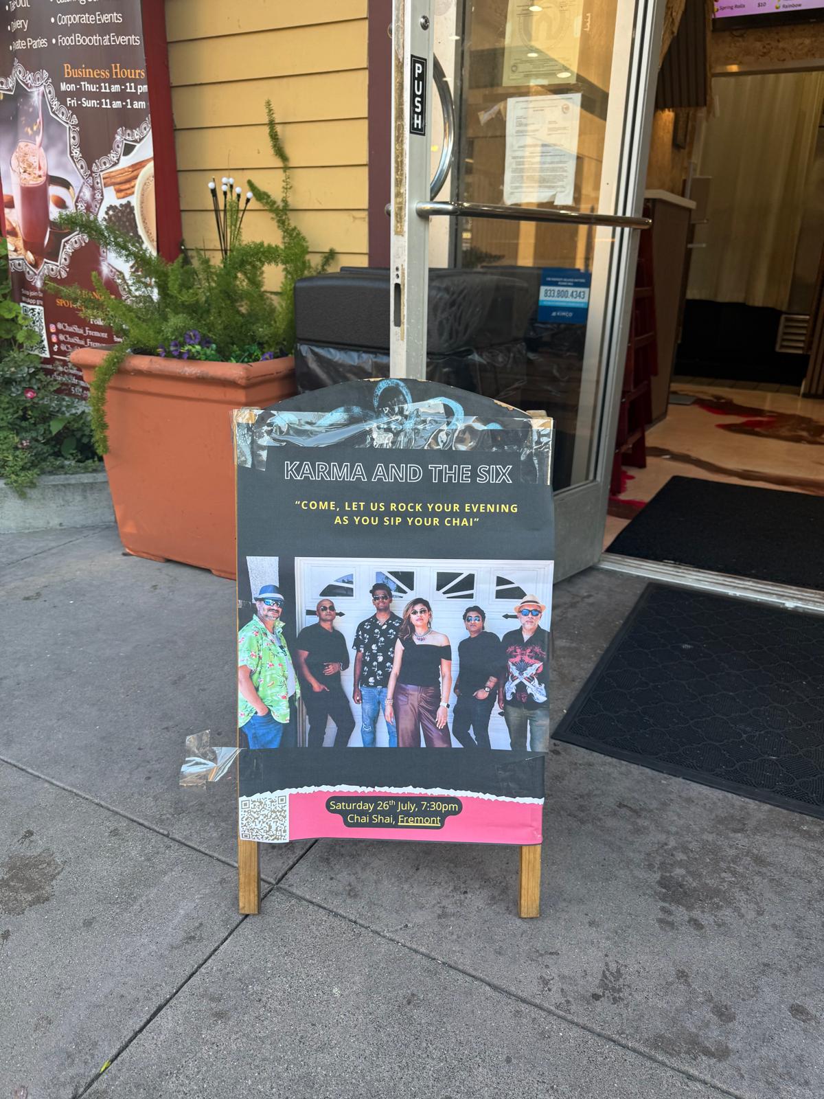 Karma And The Six promotional sign