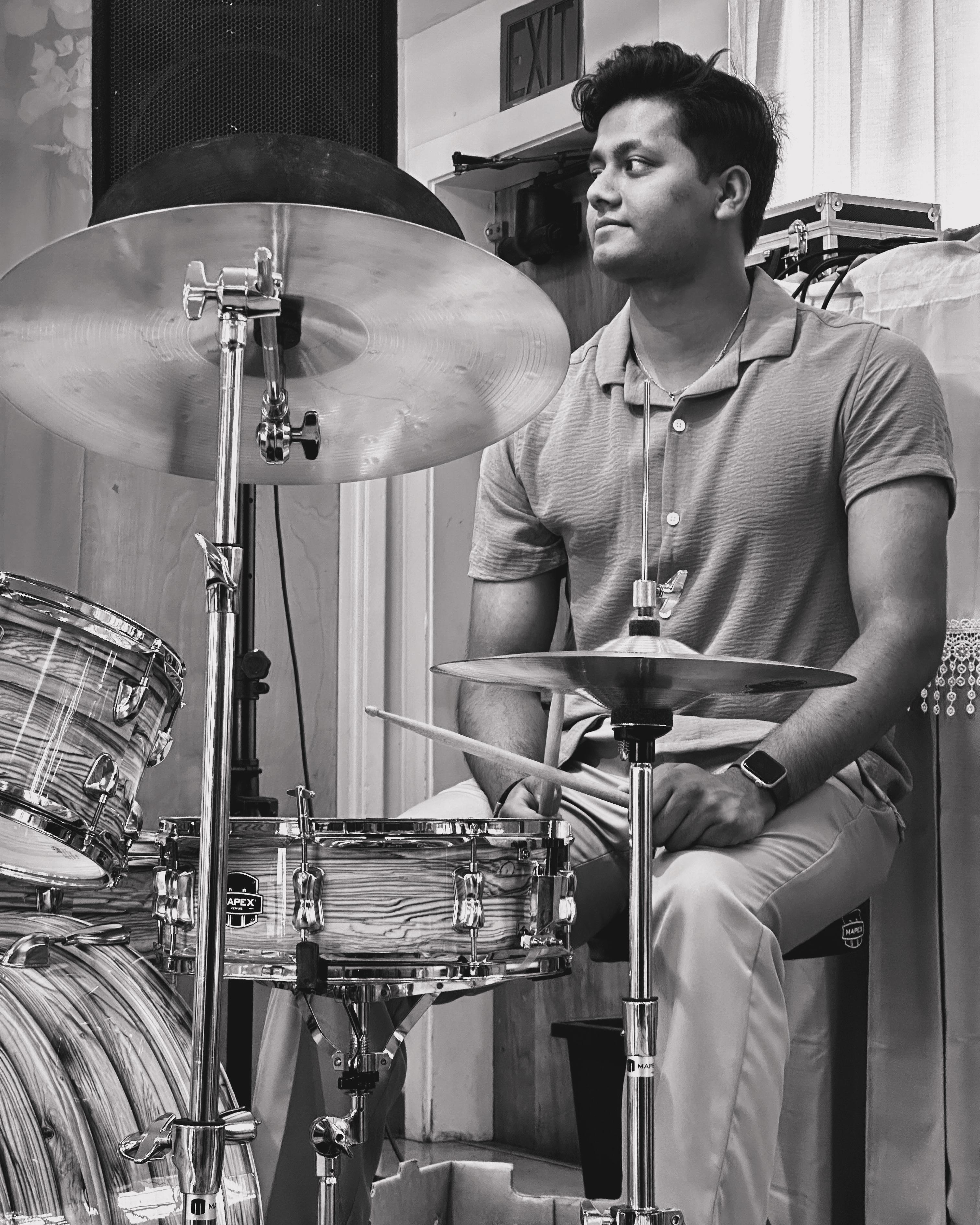 Drummer setup under stage lights
